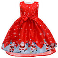 Red Christmas dress with Santa Claus print and a large bow on a white background