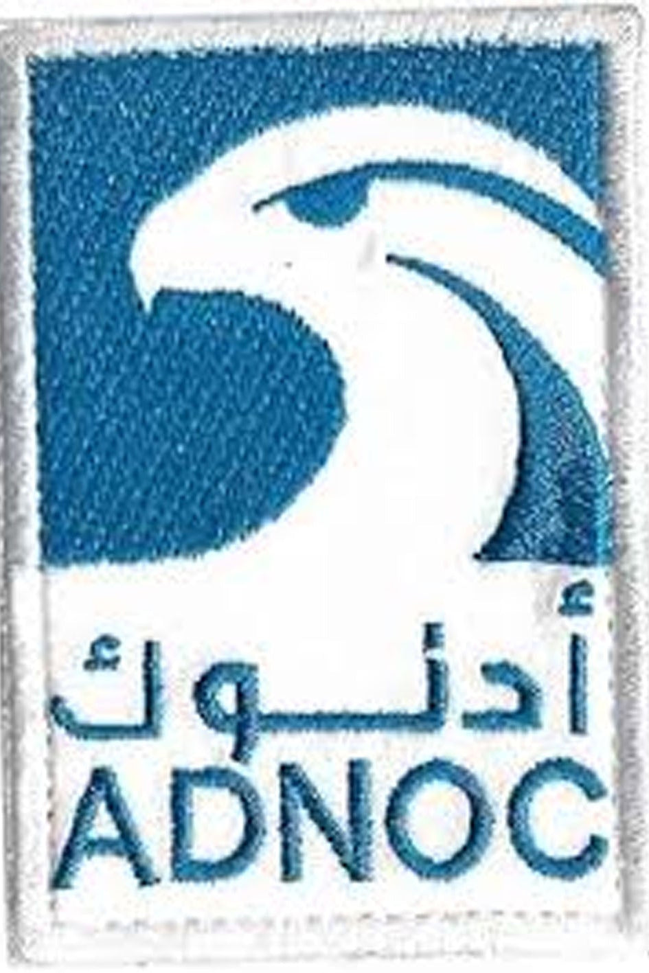 ADNOC logo with an eagle emblem on a blue background