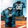 Blue camouflage sports jersey with customizable text on a blurred sports field background