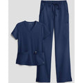 Navy blue scrub set with top and pants on a light gray background