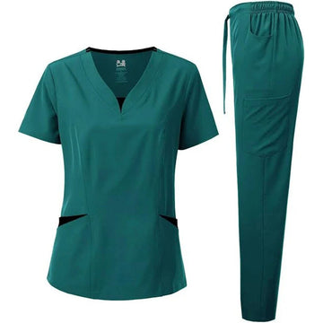 Teal scrub top and pants set on a white background