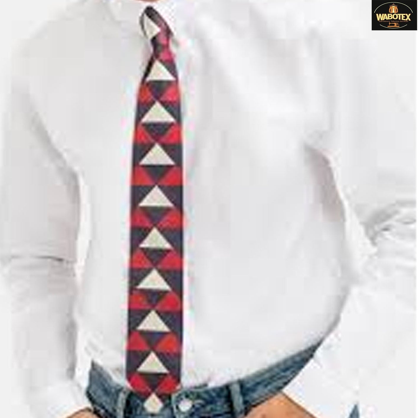 Person wearing a patterned tie with a white shirt and jeans on a white background