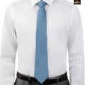 White dress shirt with a light blue tie on a white background