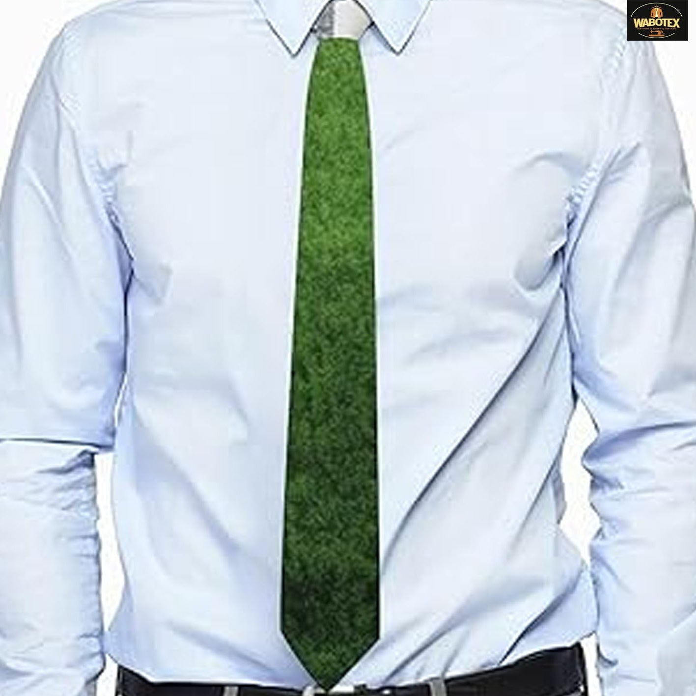 Light blue shirt with a green tie on a white background