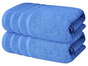 Set of blue towels stacked on a white background