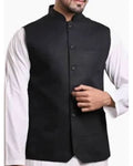 Black vest over a white shirt on a white background