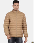 Man wearing a beige puffer jacket on a white background